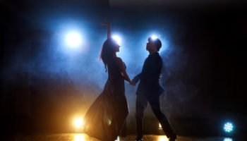 skillful-dancers-performing-dark-room-concert-light-smoke-sensual-couple-performing-artistic-emotional-contemporary-dance