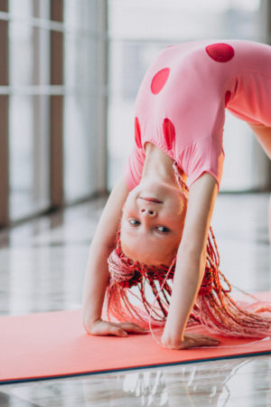 cute-little-girl-doing-gymnastics-mat