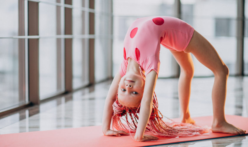 cute-little-girl-doing-gymnastics-mat